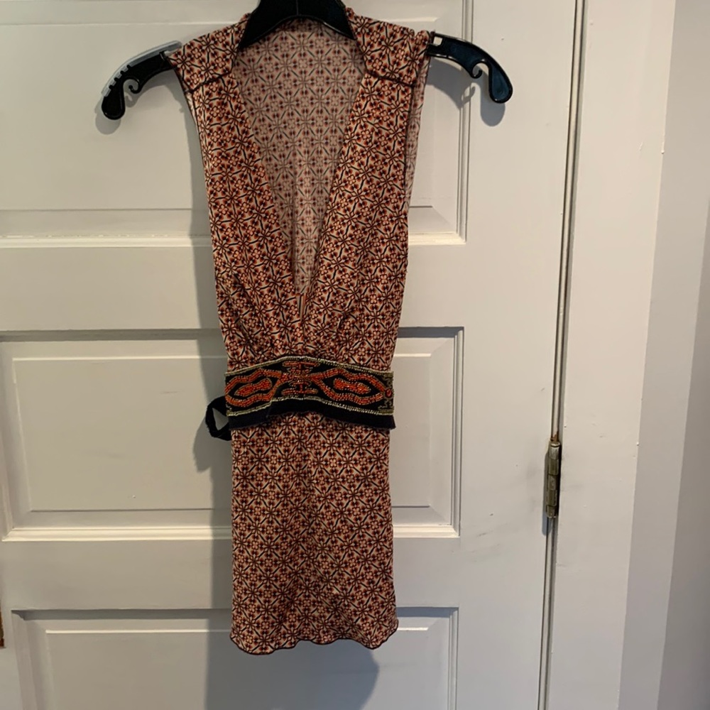 Pattern blouse with beaded detail and tie back